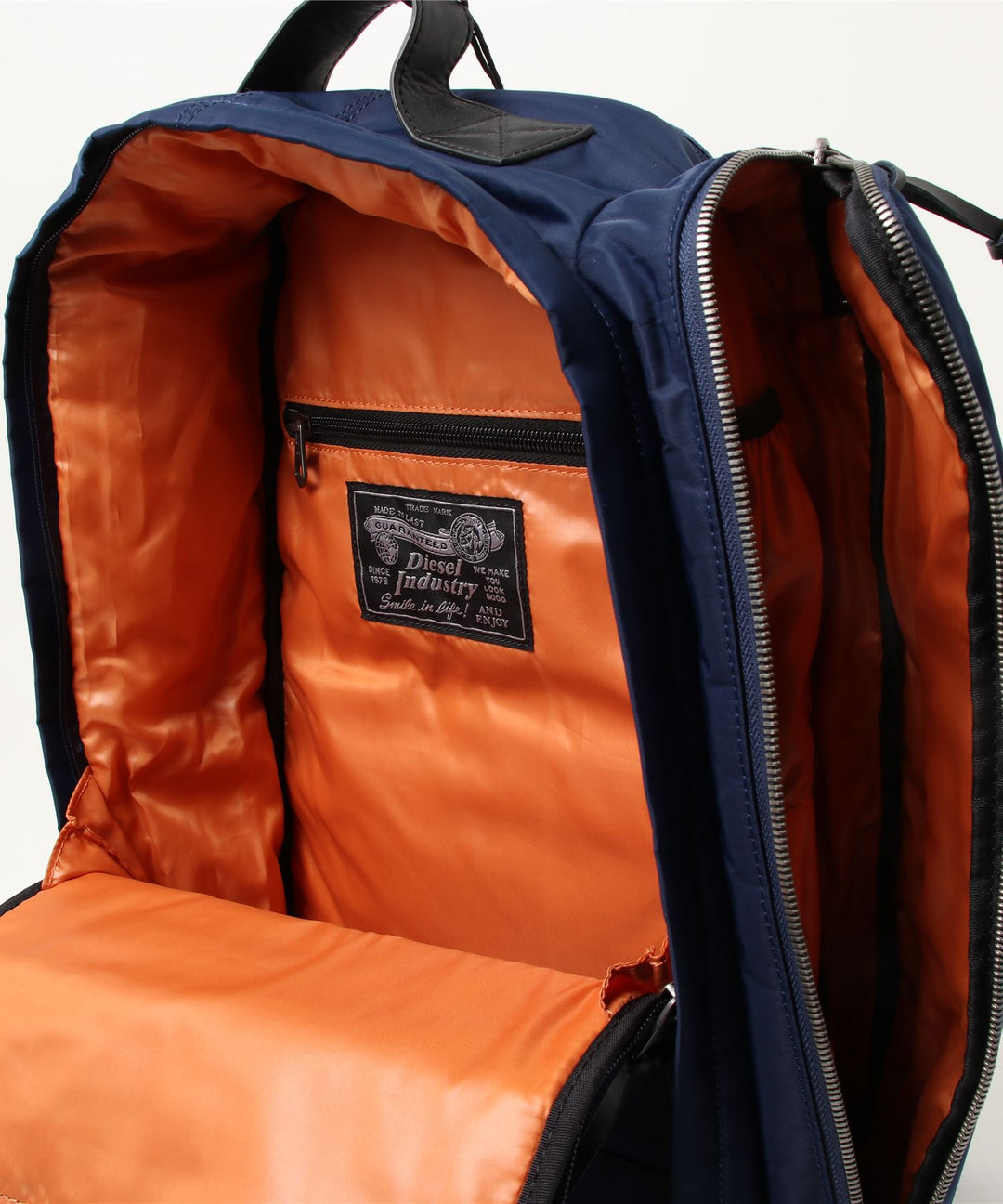 DIESEL ディーゼル メタルロゴ スリットデザイン バックパック